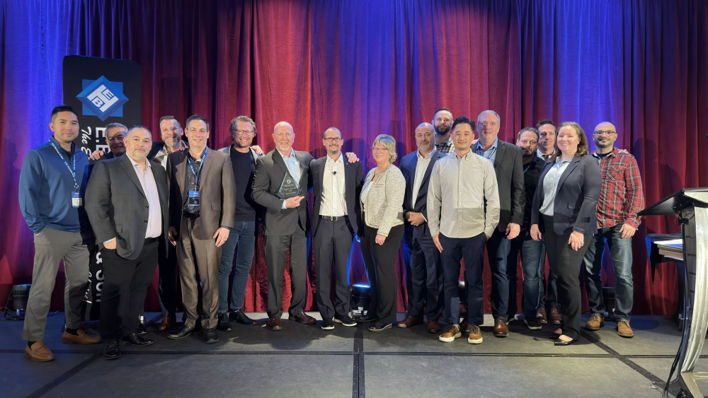 EBH and Leviton staff on stage 