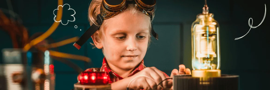 boy fixing wire which makes the lightbulb turn on