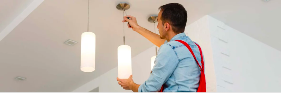 man installing a lamp